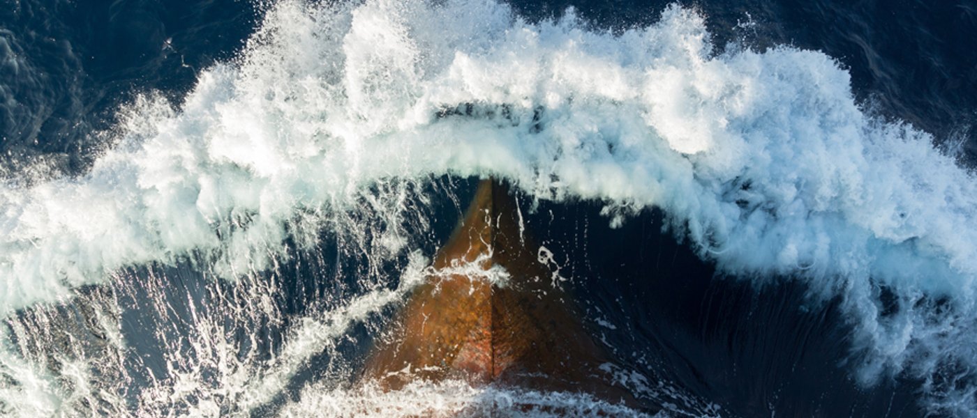 Top Down View Of Bow Of Large Ship At Sea