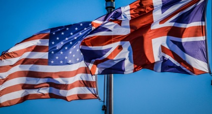 Close up of the Union Jack and the Star Spangled Banner in the breeze 